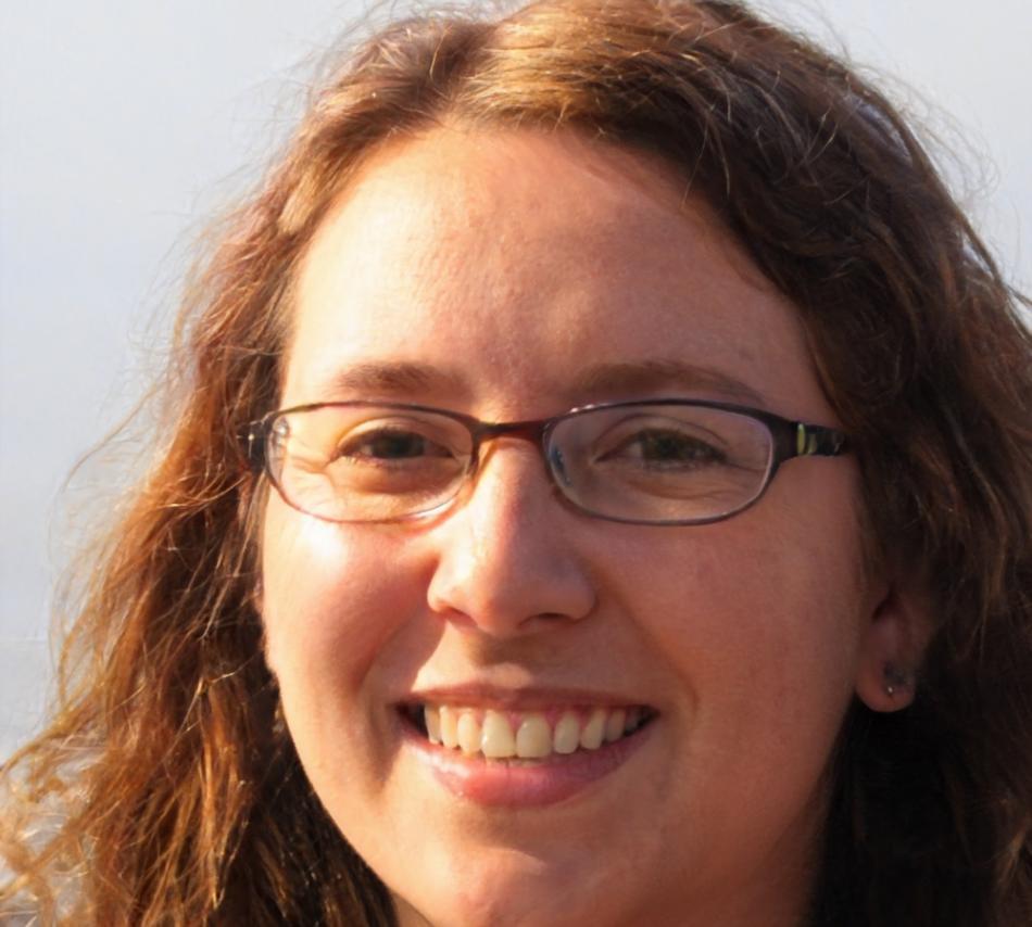 Professional headshot of program graduate who successfully implemented master budget system