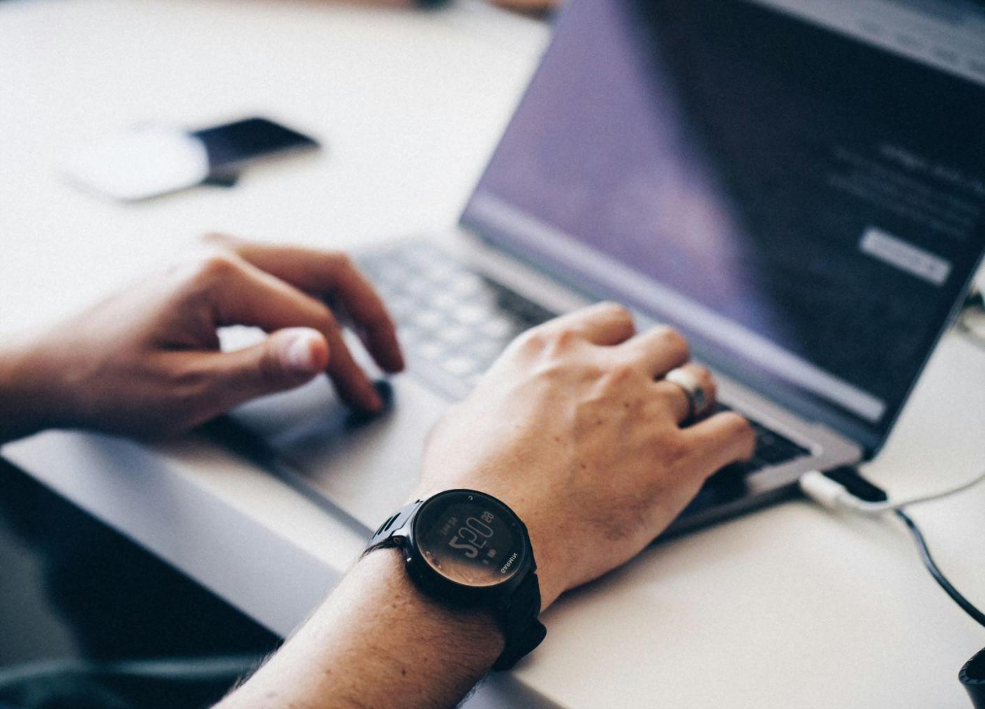 Business professionals analyzing financial reports and budget spreadsheets